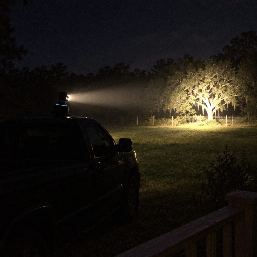 Savary PRO beam lighting up back fence at night